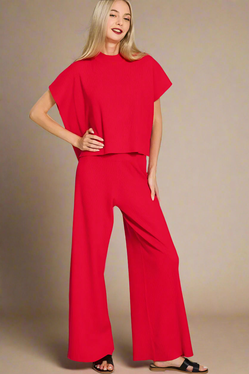 Woman wearing a red outfit on a beige background