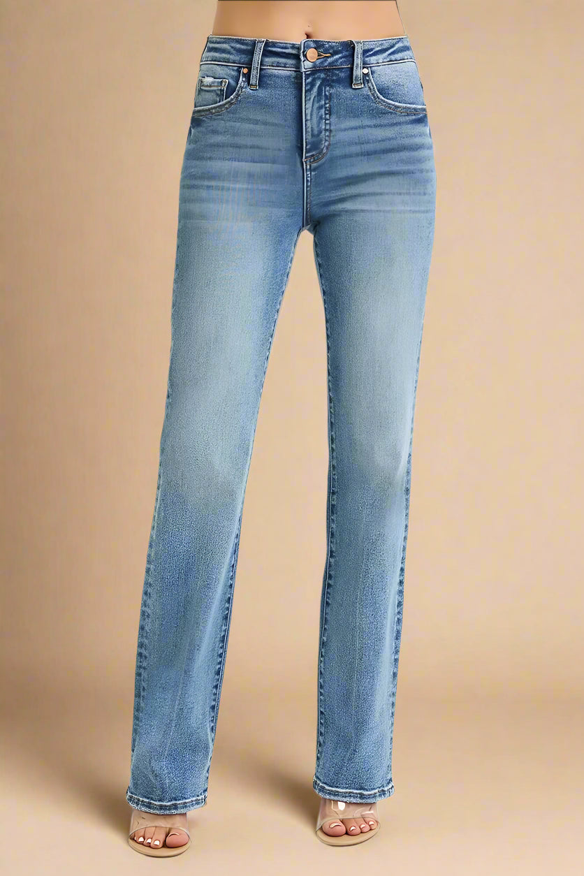 Light blue jeans on a beige background