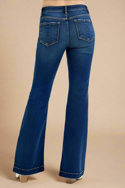 Blue jeans on a beige background