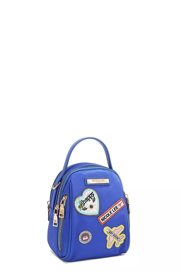 Blue backpack with colorful patches on a white background