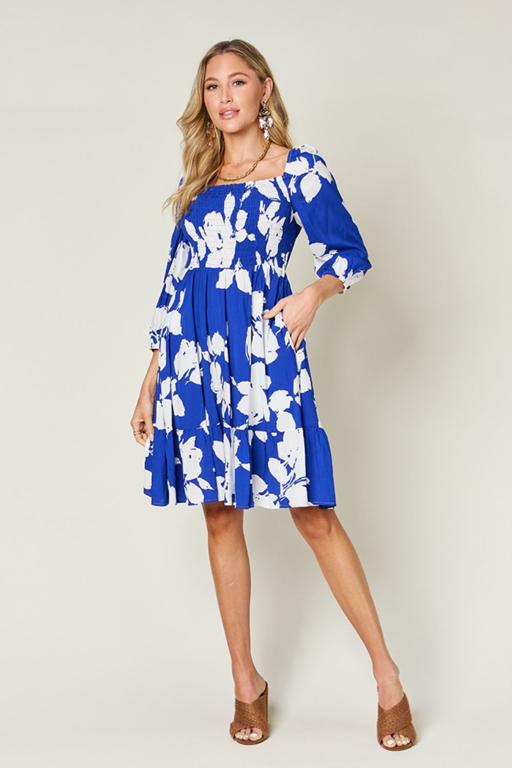 Double Take - Floral Print Ruffle Hem Smocked Knee - Length Dress with Pockets in Royal Blue