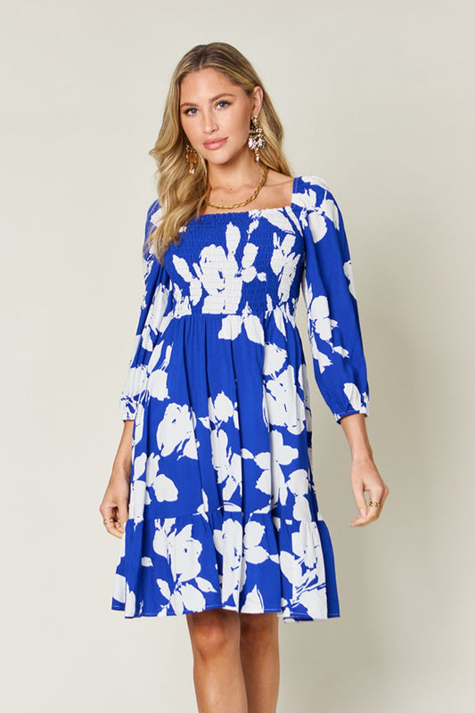 Double Take - Floral Print Ruffle Hem Smocked Knee - Length Dress with Pockets in Royal Blue