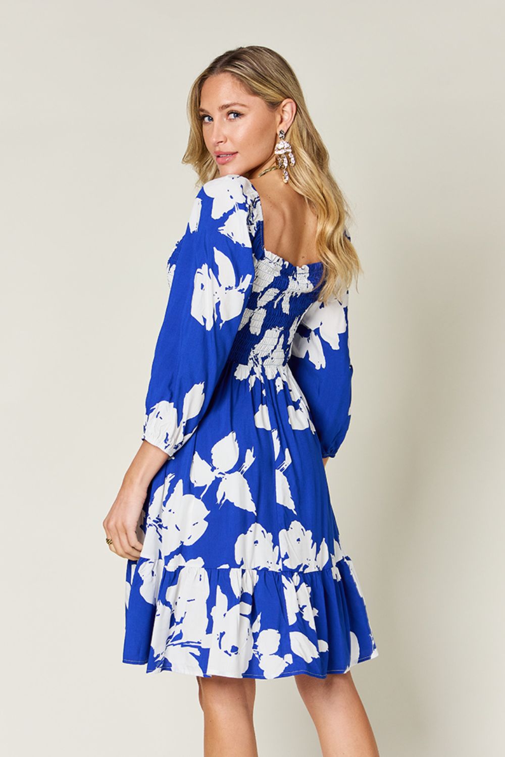 Double Take - Floral Print Ruffle Hem Smocked Knee - Length Dress with Pockets in Royal Blue