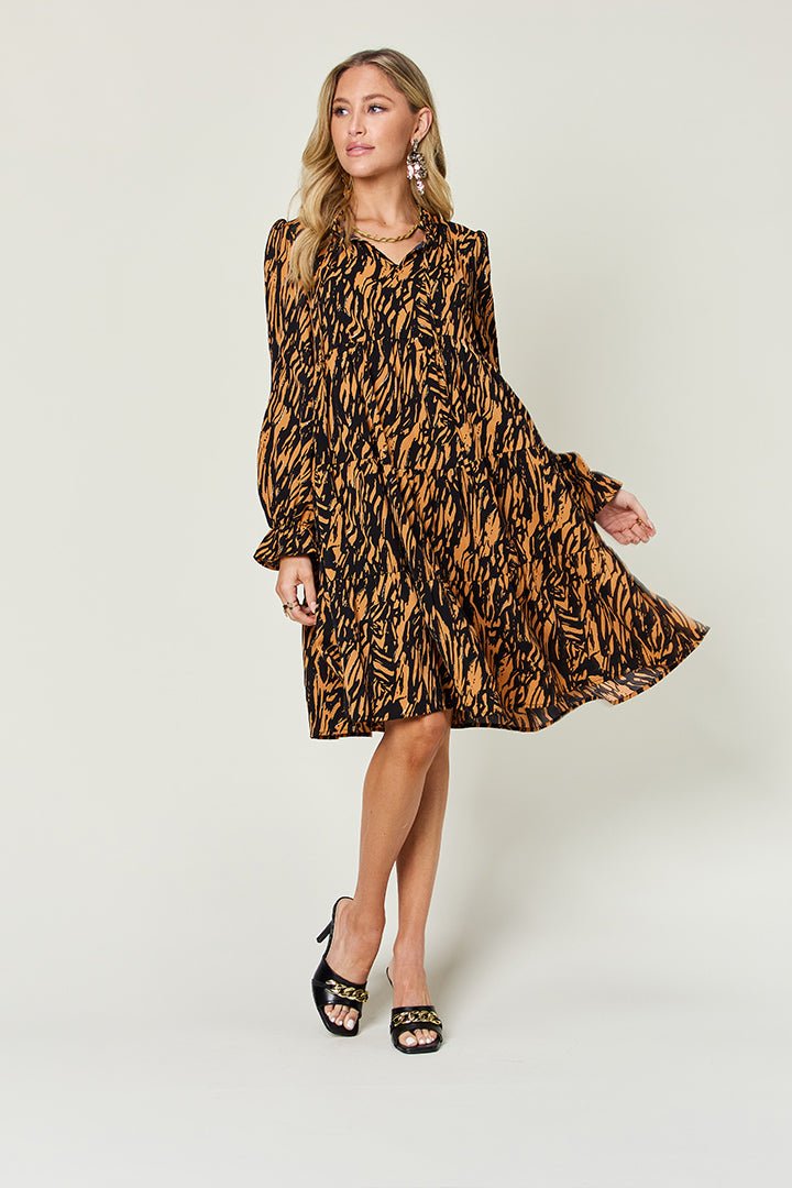 Double Take - Printed Ruffle Hem Long Sleeve Knee - Length Dress in Caramel