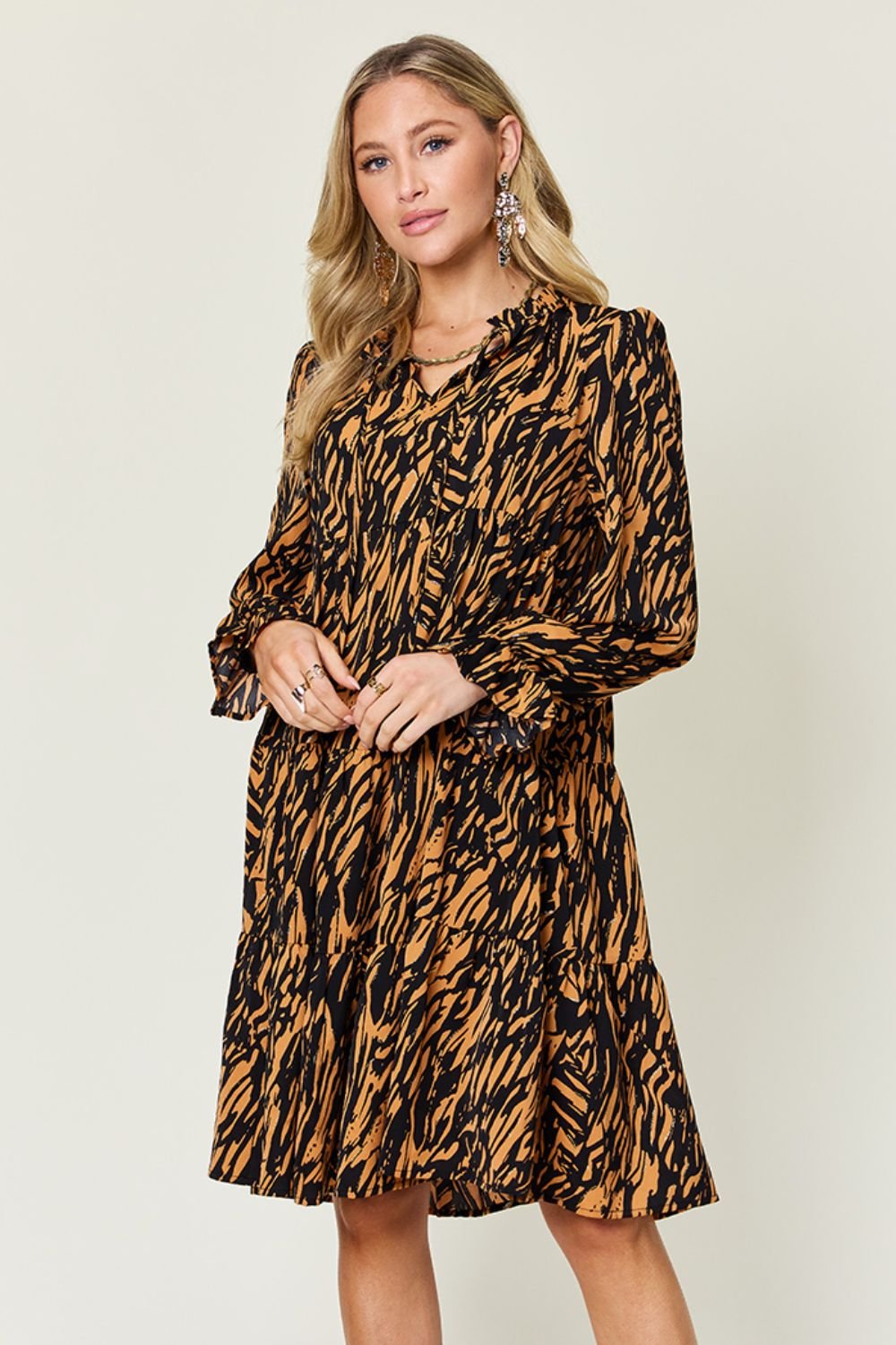 Double Take - Printed Ruffle Hem Long Sleeve Knee - Length Dress in Caramel