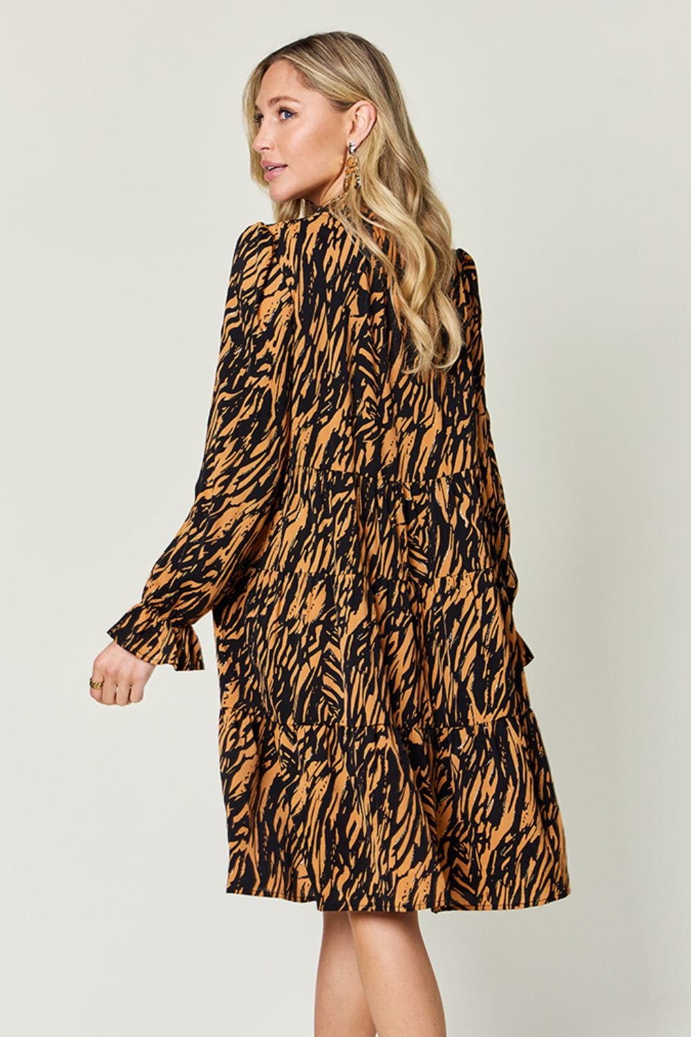 Double Take - Printed Ruffle Hem Long Sleeve Knee - Length Dress in Caramel