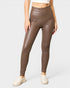Brown leather leggings worn by a person on a white background