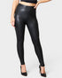 Black leather leggings worn by a person on a white background