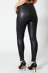 Black leather leggings worn by a person on a white background