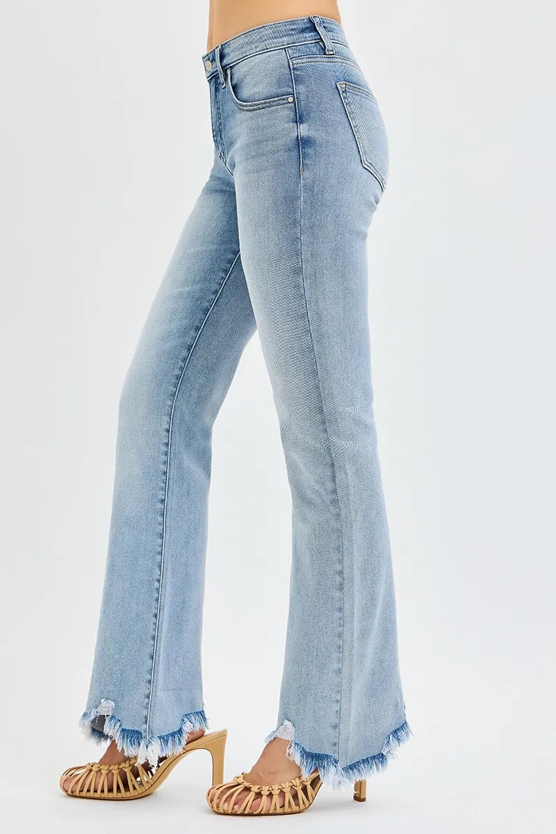 Light blue jeans worn by a person on a white background