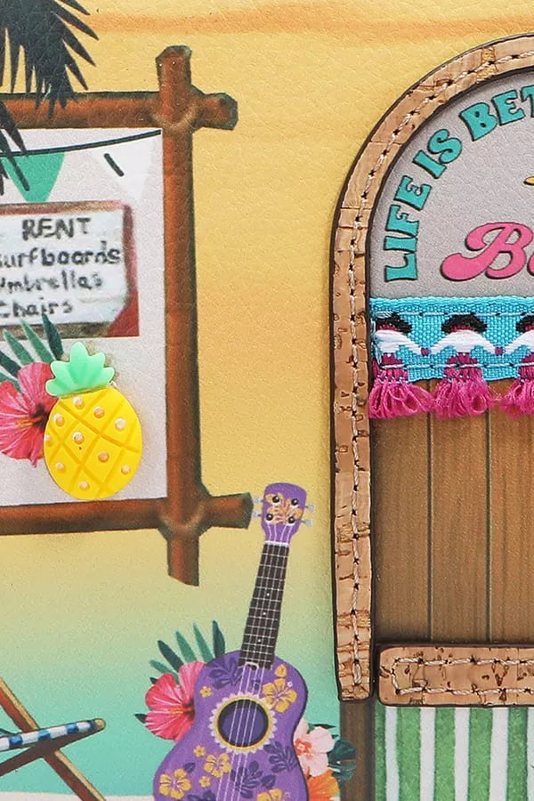 Tropical-themed decor with a pineapple, guitar, and door with text on a yellow background
