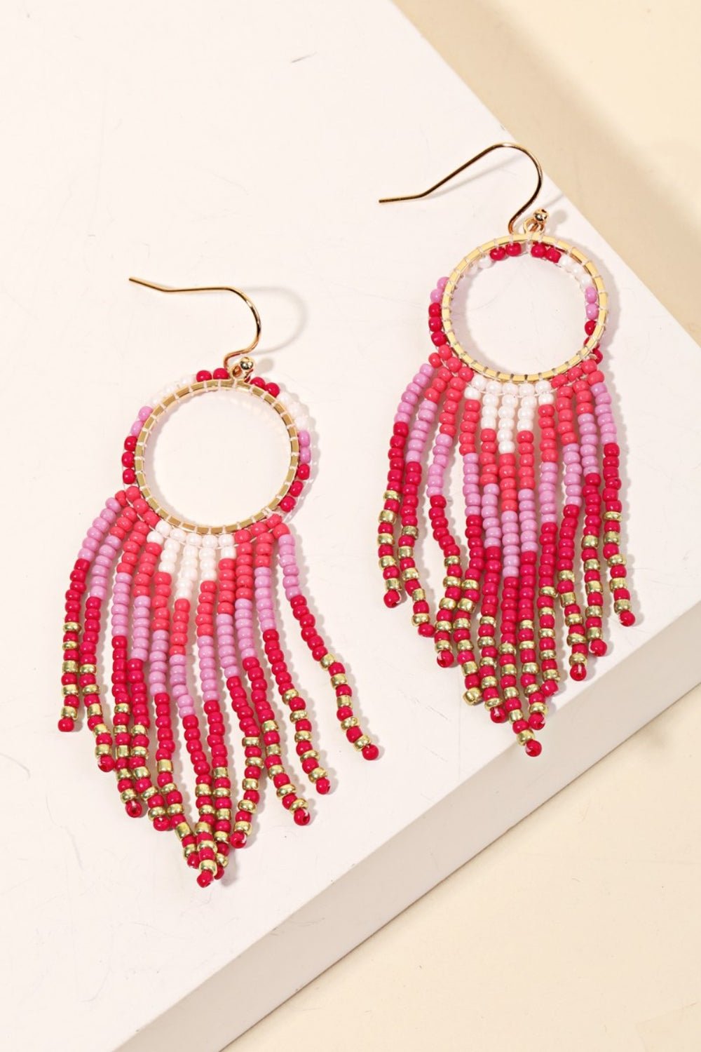 FAME ACCESSORIES - Fuchsia Circle Cutout Seed Beaded Fringe Earrings