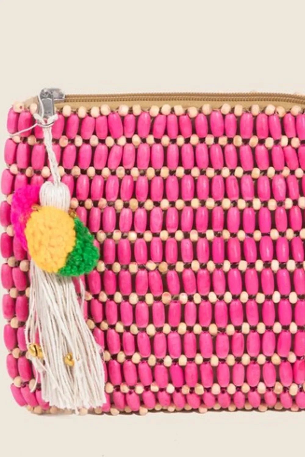 FAME ACCESSORIES - Pink Beaded Clutch with Pom Pom Tassel Charm