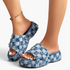 Beach Rose Co. blue checkered denim platform slides with frayed edges and wide straps on feet.