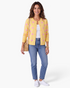 Beach Rose Co. yellow knit cardigan with pink polka dots, featuring a round neckline and button-front closure.