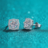Beach Rose Co. sterling silver geometric halo stud earrings featuring round moissanite centers and zircon accents.