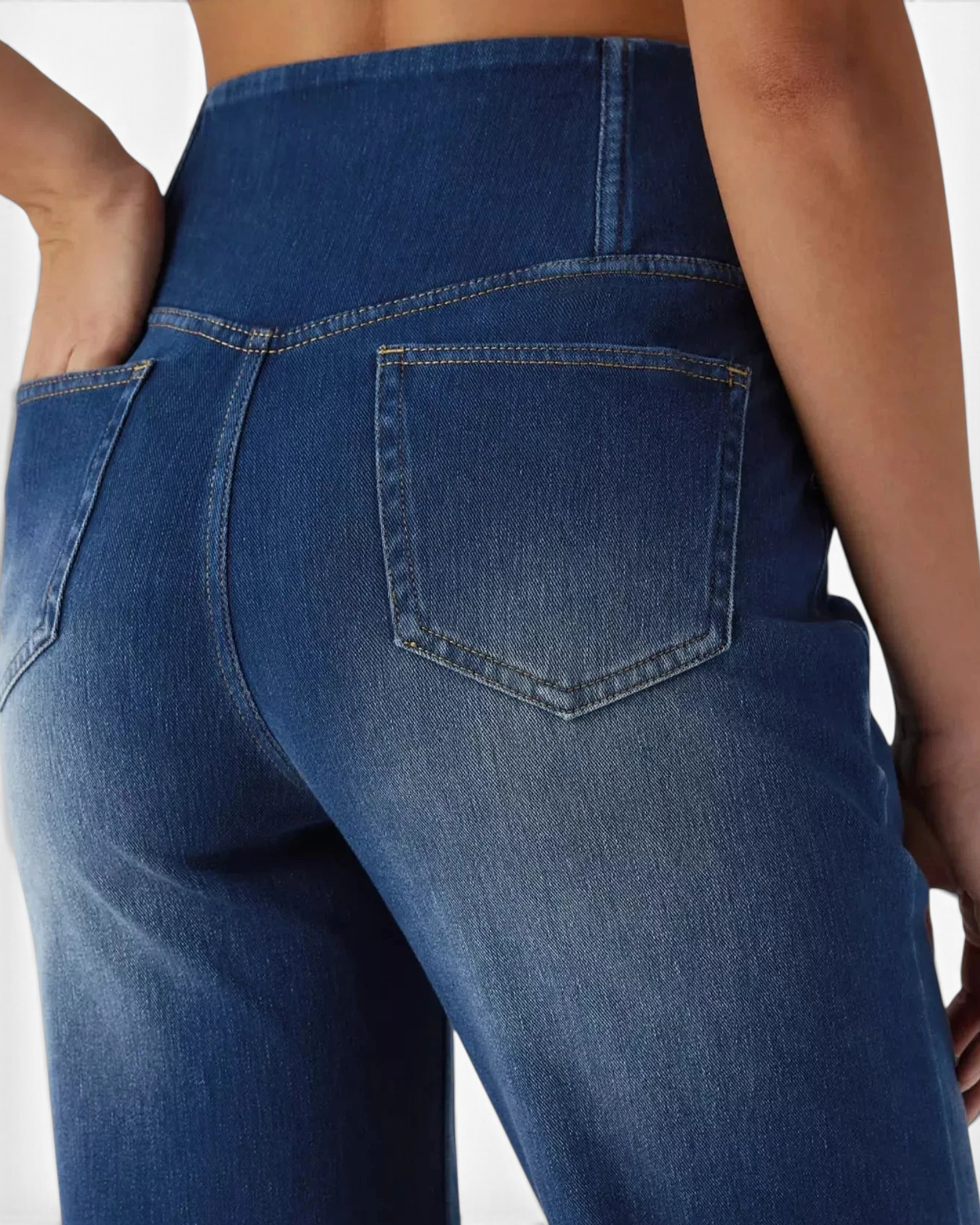 Beach Rose Co. high-rise wide-leg jeans in blue stretch denim with a crossover waistband and back patch pockets.