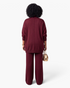 Back view of Beach Rose Co. burgundy knit turtleneck tunic and wide-leg pants set with ribbed trim.