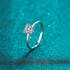 Beach Rose Co. heart-shaped moissanite solitaire ring in polished rhodium-plated sterling silver.