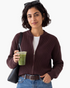 Beach Rose Co. coffee brown zip-up knit cardigan with ribbed trim and relaxed sleeves worn by a woman.