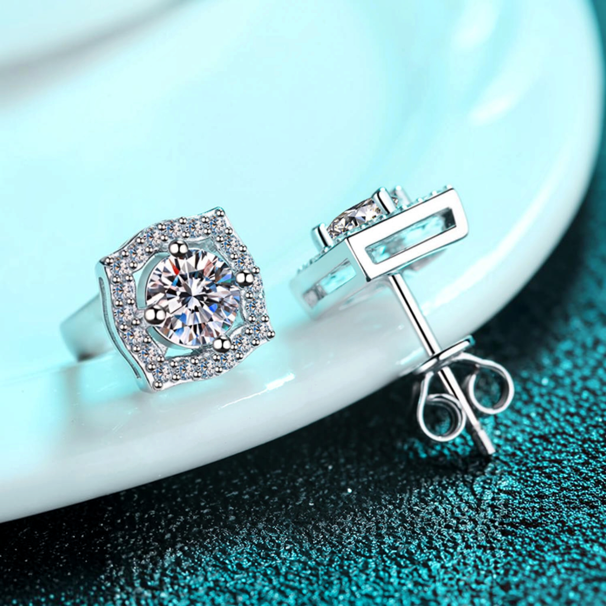 Beach Rose Co. sterling silver geometric halo stud earrings with round moissanite centers and zircon accents.