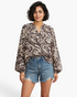 Beach Rose Co. charcoal and cream viscose blend blouse with mixed animal print, split neckline and billowy sleeves.