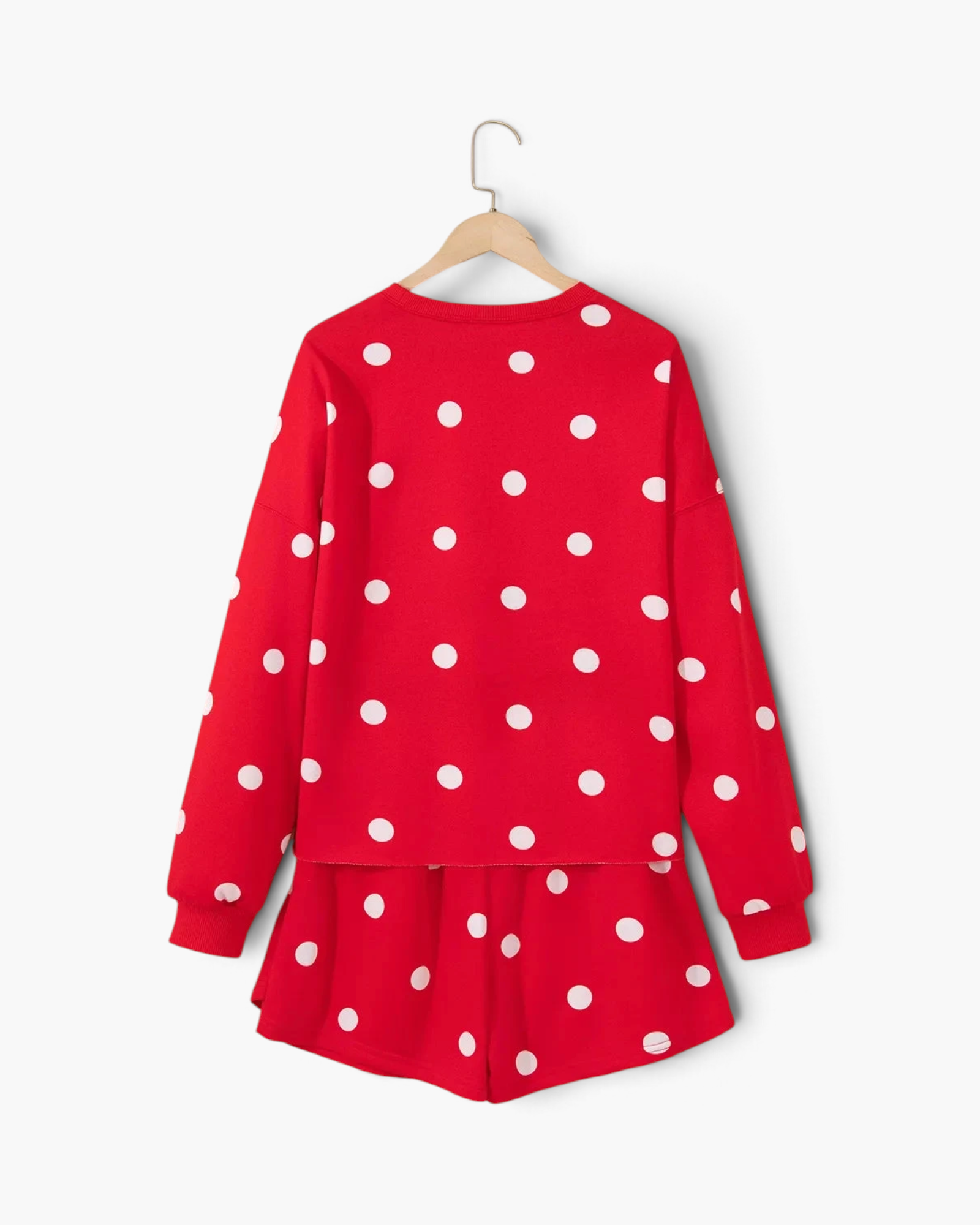 Beach Rose Co. red and white polka dot sweatshirt and skort set with long sleeves and a flared skirt overlay.