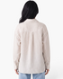 Back view of Beach Rose Co. beige and white striped polyester button-up shirt with a relaxed fit and back pleat.