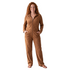 Beach Rose Co. brown velour zip-front jumpsuit with long sleeves, stand collar, and wide-leg silhouette.