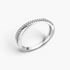 Beach Rose Co. sterling silver crisscross ring featuring a delicate band with sparkling moissanite stones.