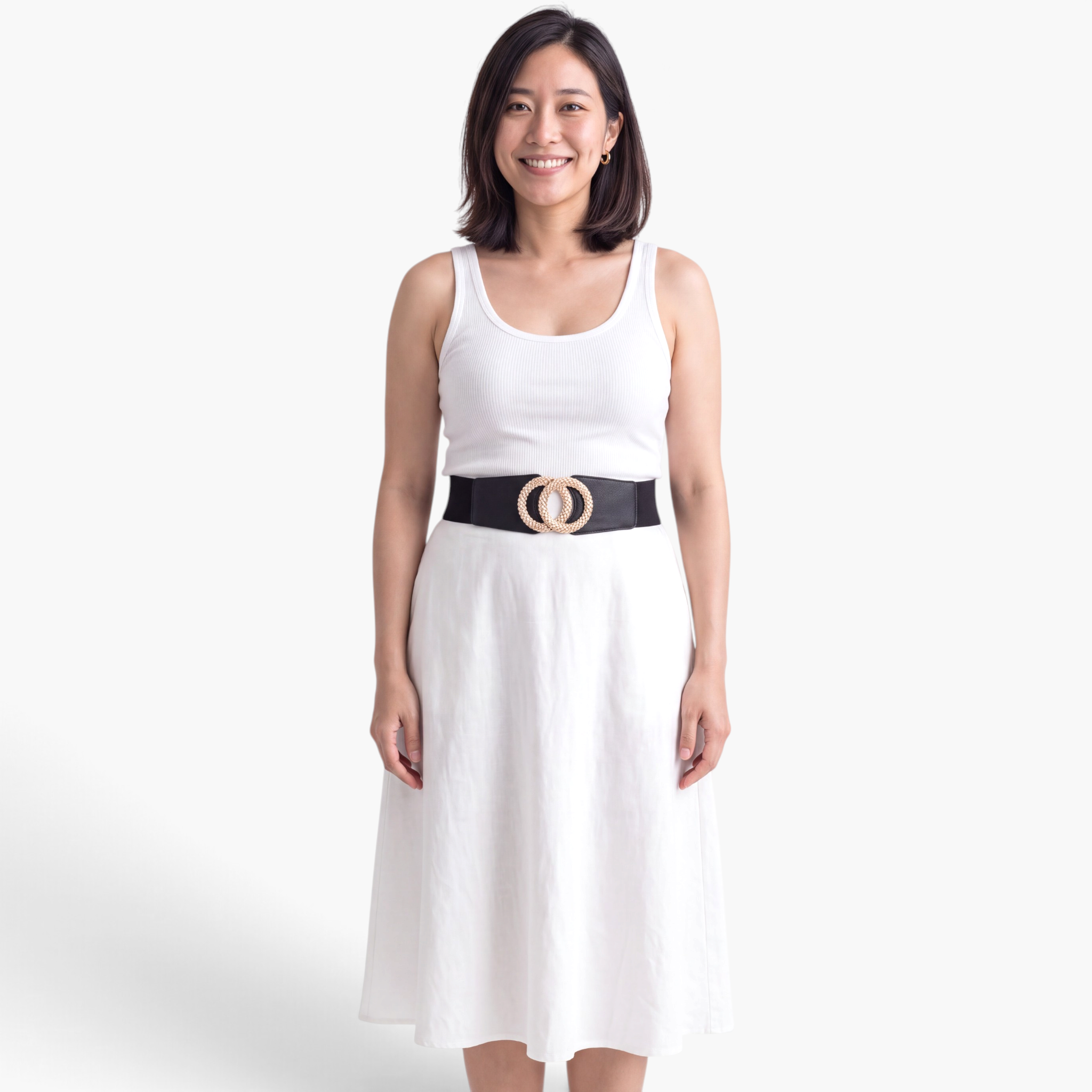 Beach Rose Co. black stretch belt with a gold-tone textured double circle buckle worn over a white dress.