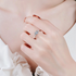 Beach Rose Co. sterling silver ring featuring a heart-shaped moissanite center stone and baguette side stones.