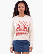 Beach Rose Co. cream knit sweater with red reindeer and snowflake festive pattern and ribbed crew neckline.