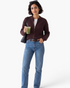 Beach Rose Co. coffee brown zip-up knit cardigan with ribbed trim and relaxed sleeves worn with jeans.