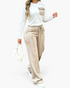 Beach Rose Co. ivory and beige ribbed two-piece set with a contrast chest pocket and wide-leg drawstring pants.