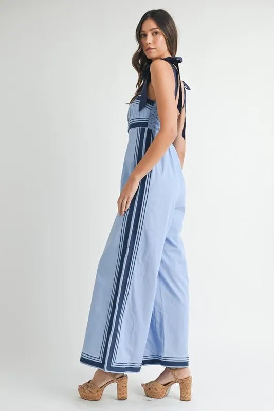 Mable - Sleeveless Chambray Blue Jumpsuit with Navy Trim