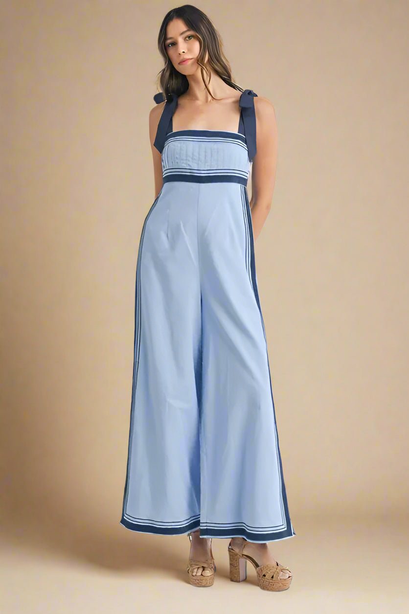 Mable - Sleeveless Chambray Blue Jumpsuit with Navy Trim