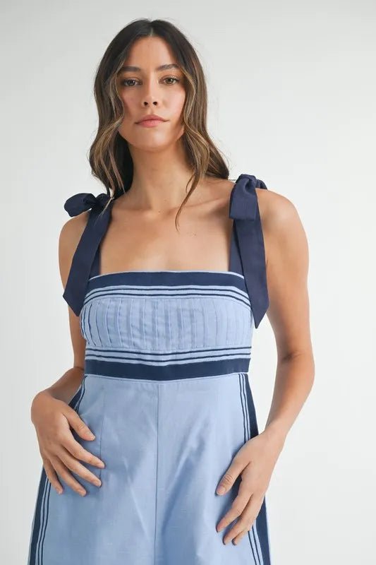 Mable - Sleeveless Chambray Blue Jumpsuit with Navy Trim