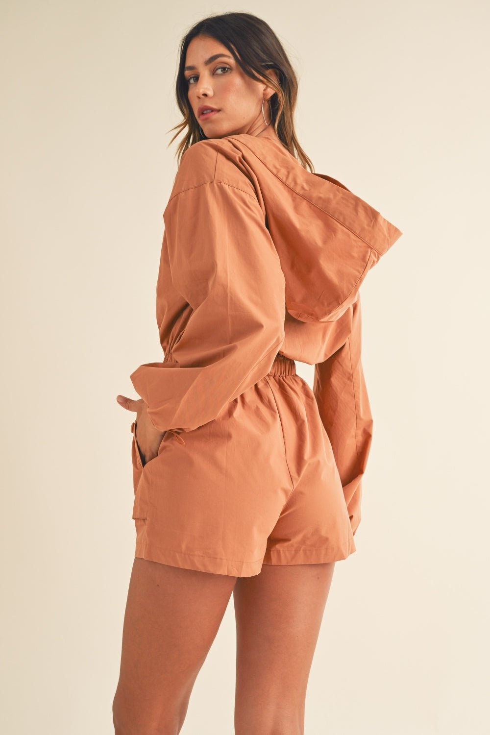 Mable - Snap Down Long Sleeve Hooded Romper in Tan