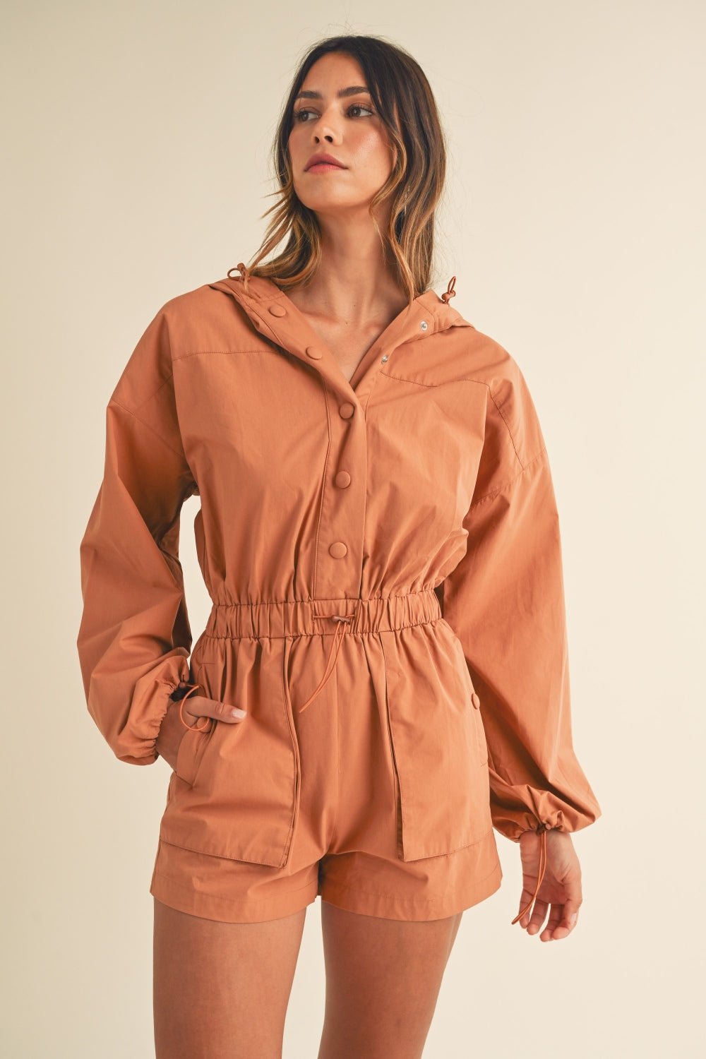 Mable - Snap Down Long Sleeve Hooded Romper in Tan