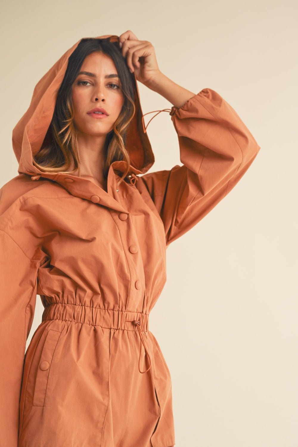 Mable - Snap Down Long Sleeve Hooded Romper in Tan