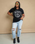T-shirt graphique avec symbole de paix et papillon en noir