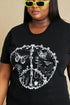 T-shirt graphique avec symbole de paix et papillon en noir