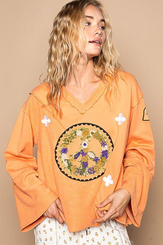 POL - Embroidered Peace Sign Ruffled V - Neck Top in Sherbet