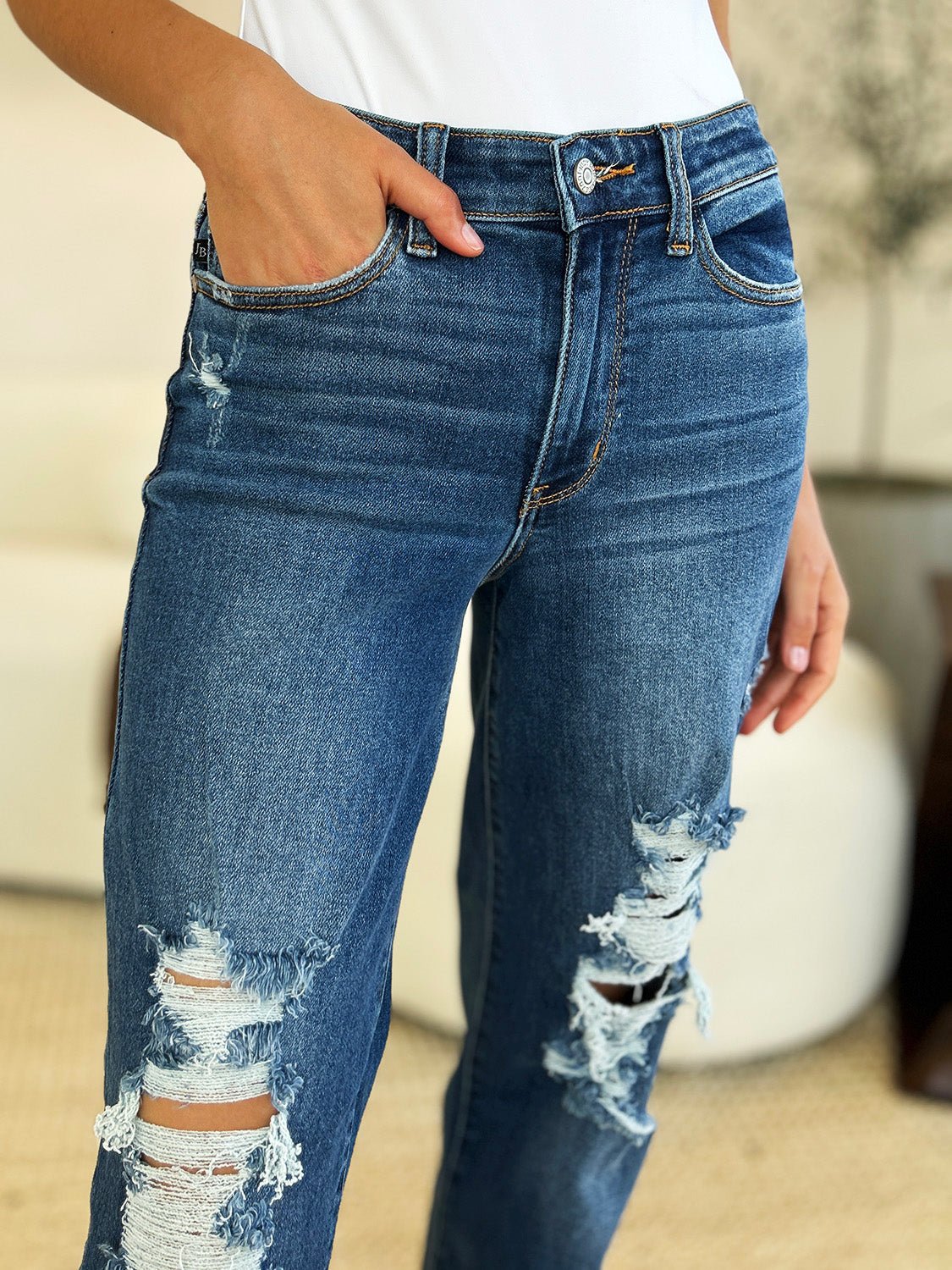 Judy BlueMedium Wash Mid Rise Distressed Raw Hem Jeans